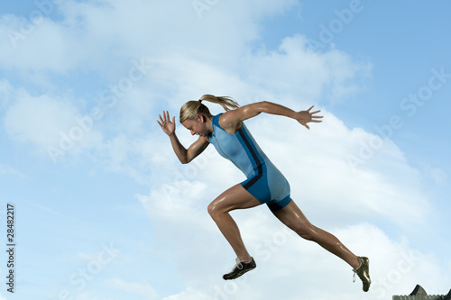 Fototapeta Naklejka Na Ścianę i Meble -  Female Sprinter