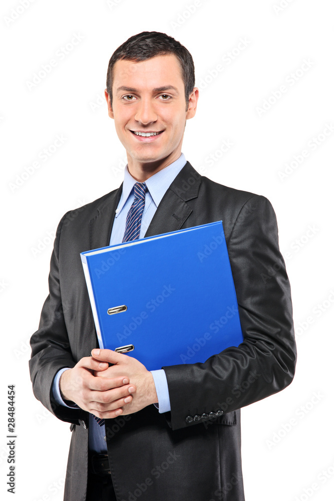 Portrait of a happy businessman holding a fascicule Portrait of a happy businessman holding a fascicule