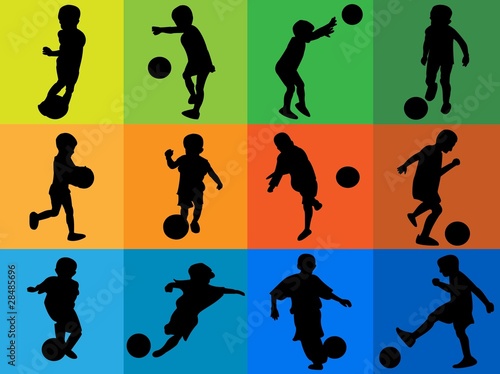 Silhouettes of kids playing soccer
