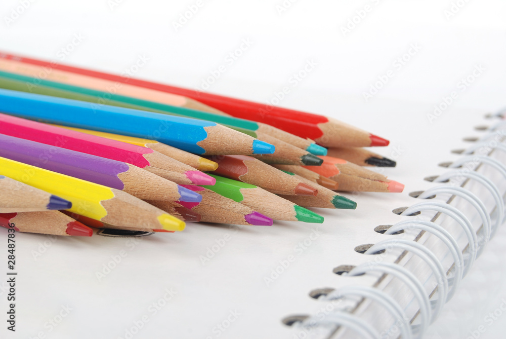 Obraz premium Color pencil and notepad