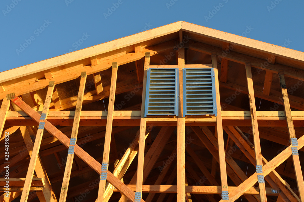 Obraz premium New Home Under Construction with Roof Close Up