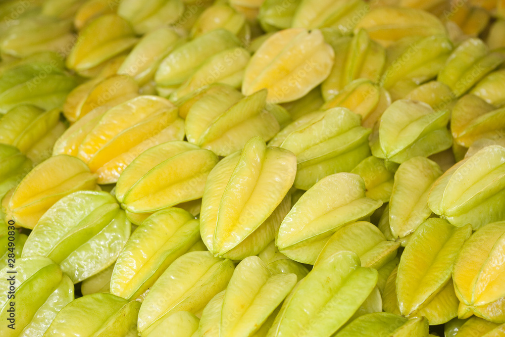 A bunch of tropical chinese star fruit, also called carambola gr A bunch of tropical chinese star fruit, also called carambola gr