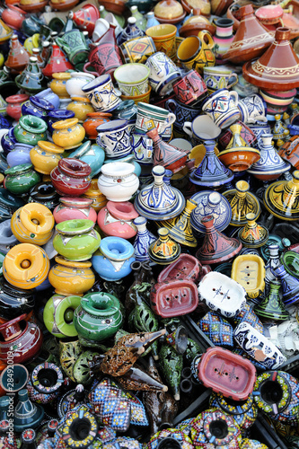 Display of small pottery tagines and ashtrays in Meknes