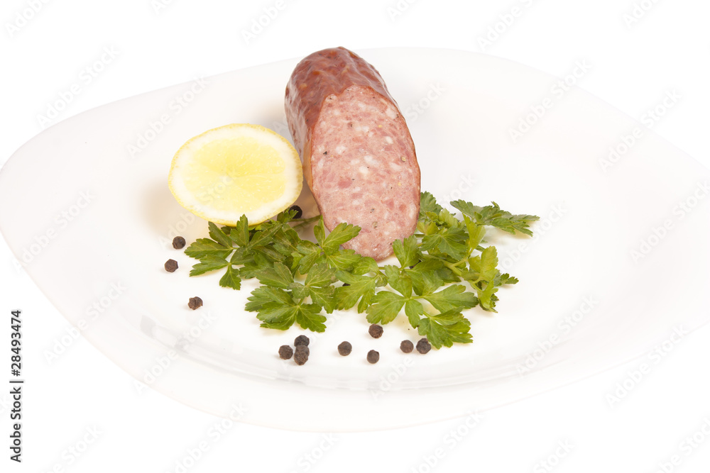 Fototapeta premium Salami on plate isolated on white background with clipping path