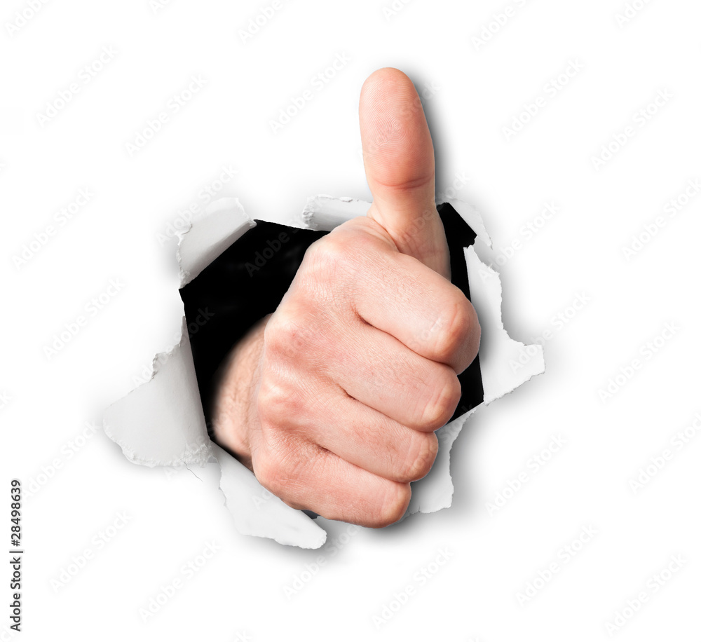 Hand making thumbs up sign breaking through a thin wall or paper Photos |  Adobe Stock