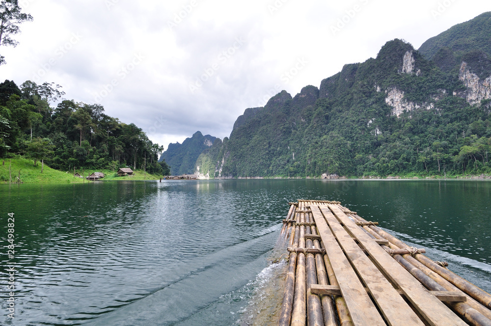 Bamboo raft heading on lake in Kho Sok national park, Thailand