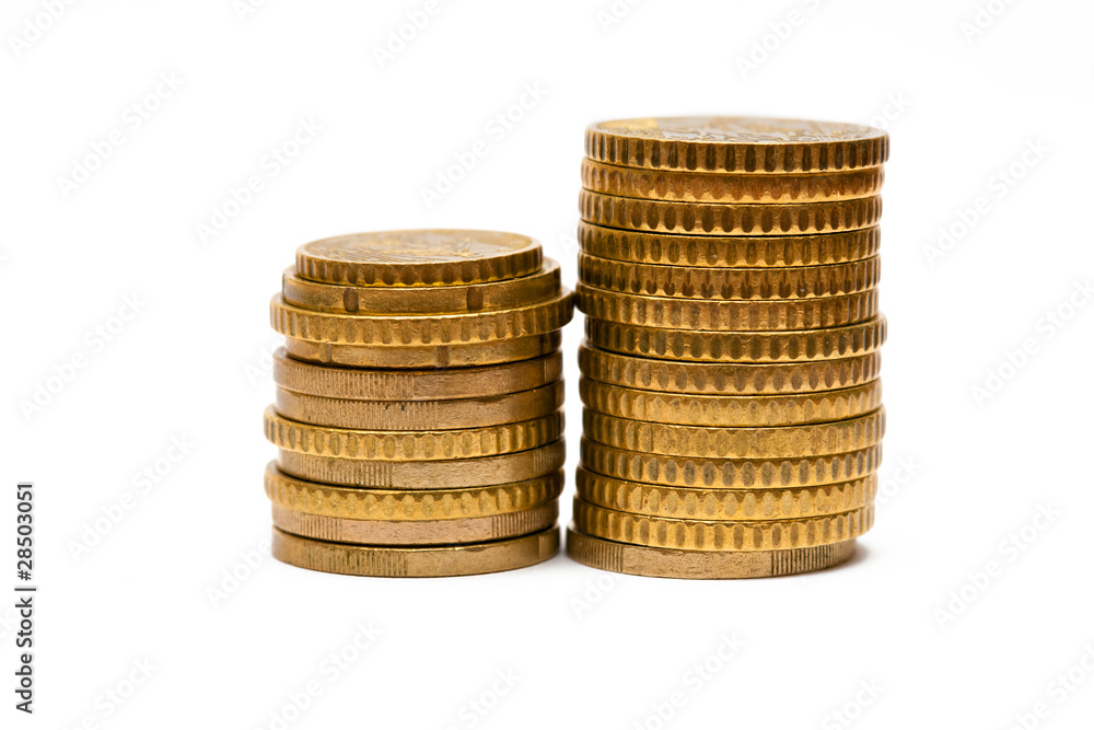 Piles of euro coins isolated on white