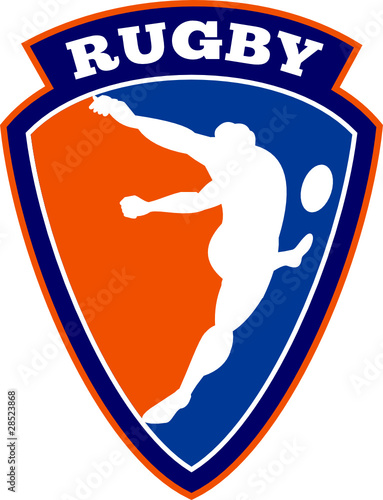 rugby player kicking ball shield