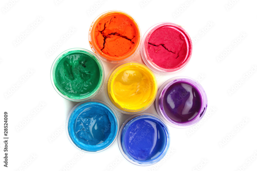 Colorful vibrant cans of gouache isolated on white Colorful vibrant cans of gouache isolated on white