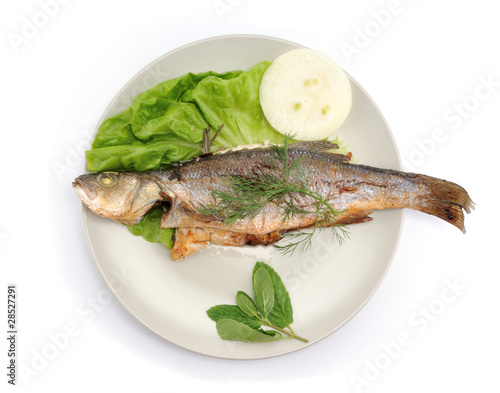 Fried fish with vegetable isolated on white background.