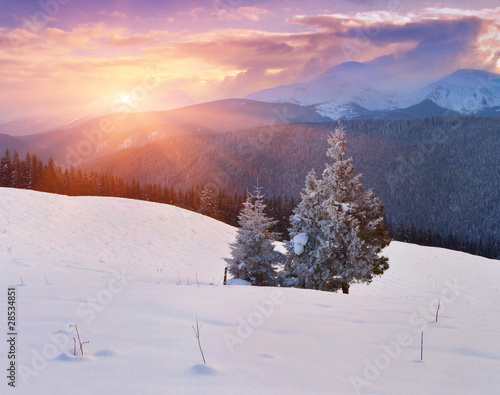 colorful winter sunrise in the mountains