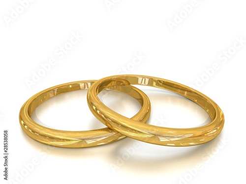 Gold wedding rings on white Background