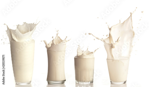 fresh milk splashing on a glass on white background collection
