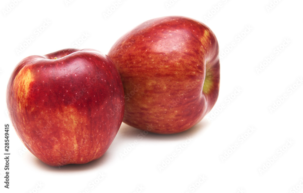 two juicy red apples isolated on white two juicy red apples isolated on white
