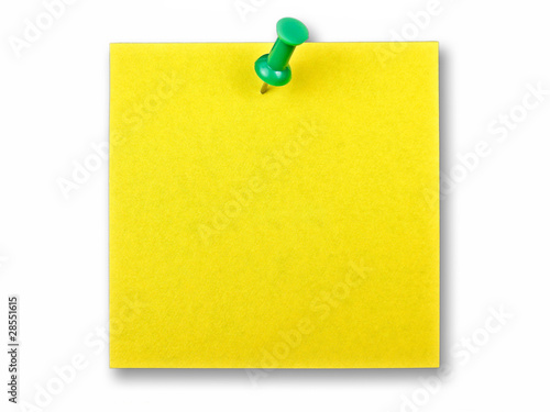 Yellow note with pin on white background