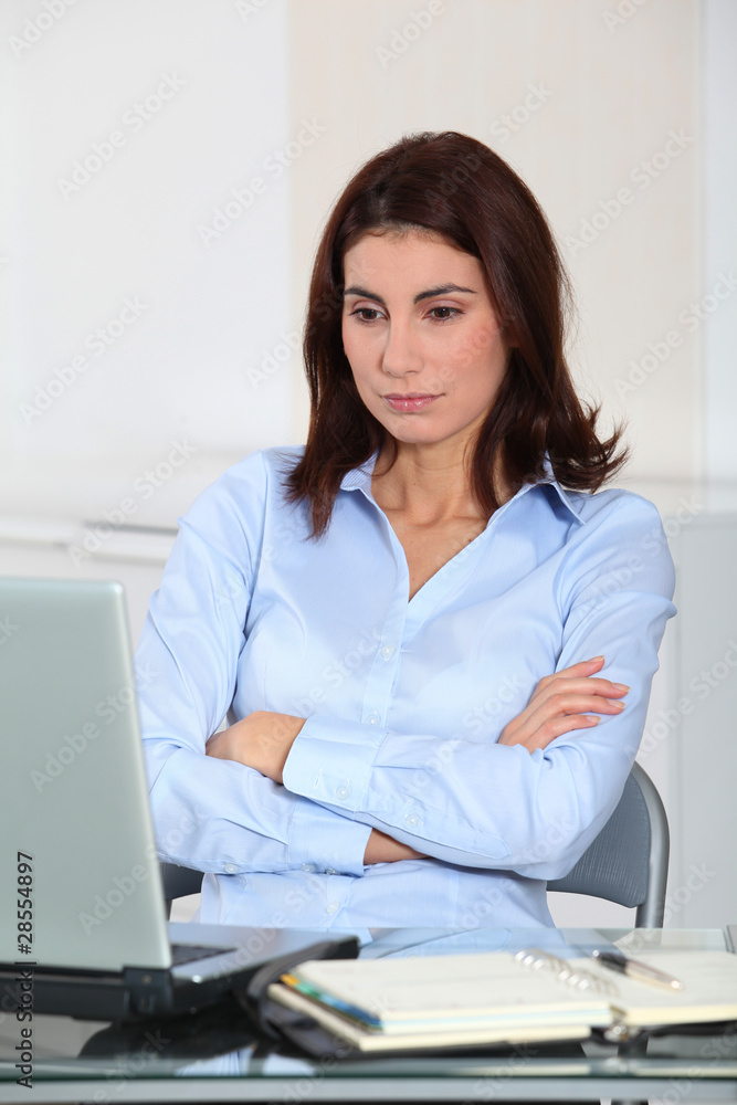 Portrait of unhappy businesswoman