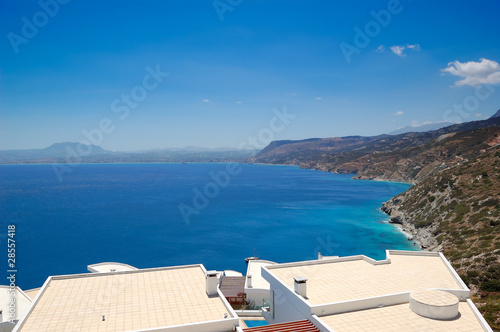Roofs of luxury villas with a view on Giouhtas mountain where my