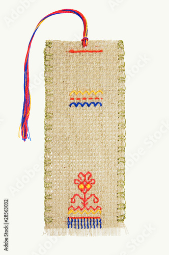 The embroidered bookmark for the book