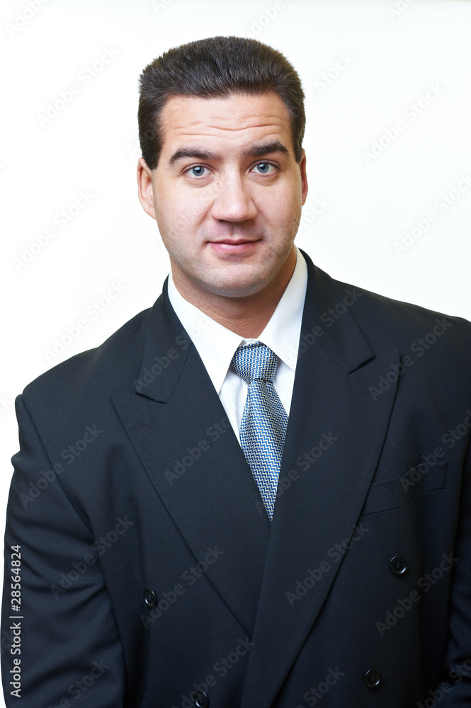 Attractive man in black suit isolated on white Attractive man in black suit isolated on white