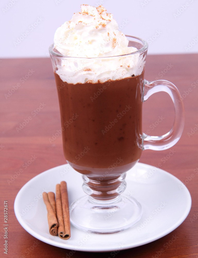 Hot chocolate with whipped cream and cinnamon Hot chocolate with whipped cream and cinnamon