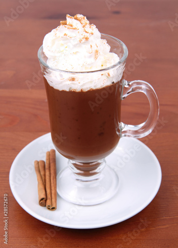 Hot chocolate with whipped cream and cinnamon