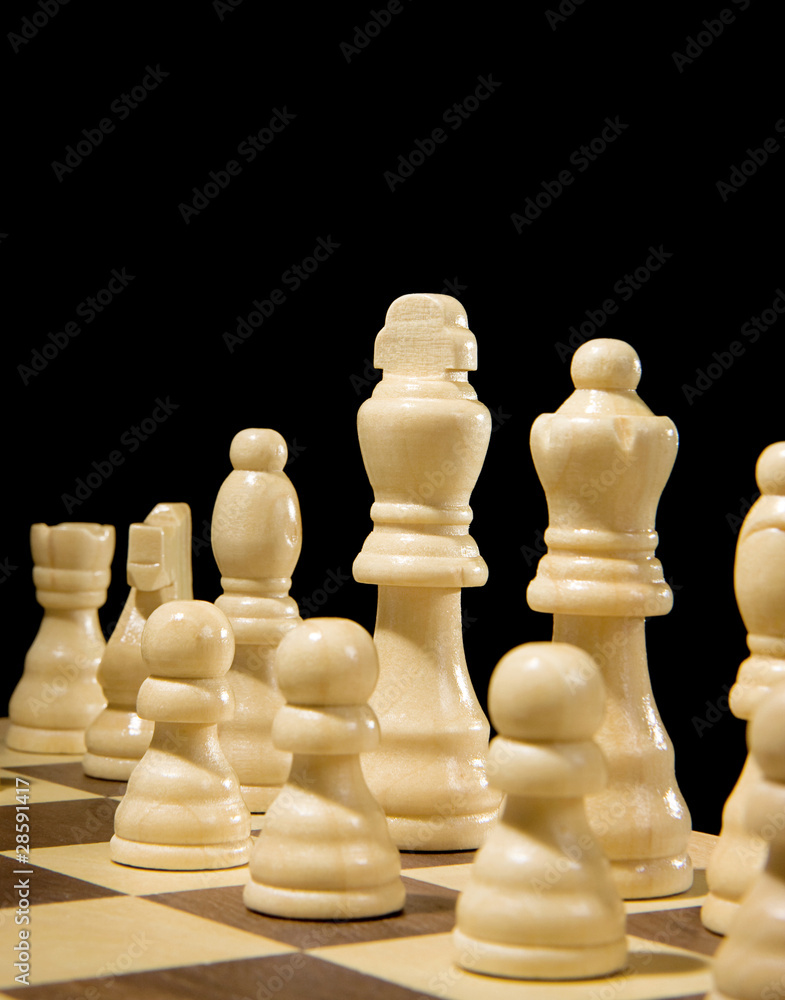 chess piece on board isolated on black chess piece on board isolated on black