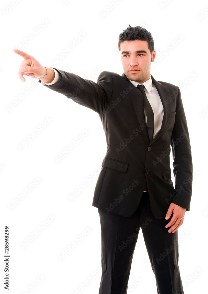 young business man in a suit pointing with his finger young business man in a suit pointing with his finger