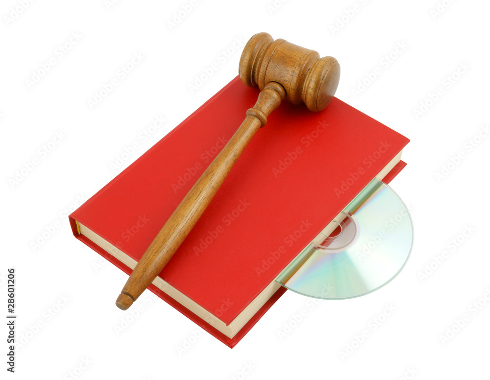 Red book with cd and gavel isolated on white