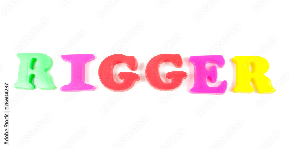 rigger written in fridge magnets on white background rigger written in fridge magnets on white background