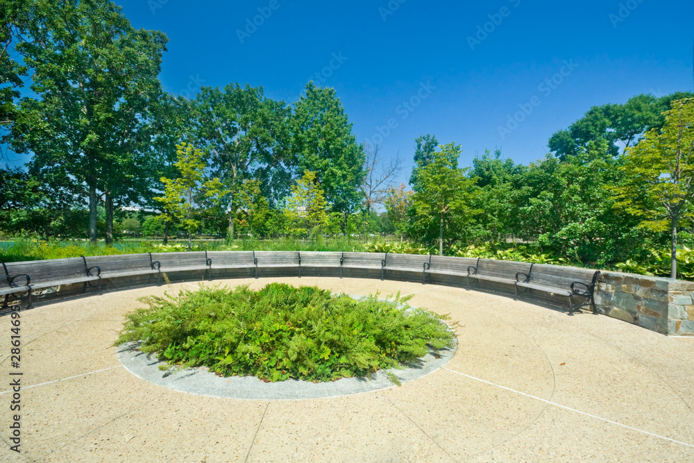 Wide Angle Curving Benches Park Outside in a Row Wide Angle Curving Benches Park Outside in a Row