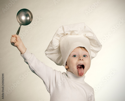 The little boy in a suit of the cook