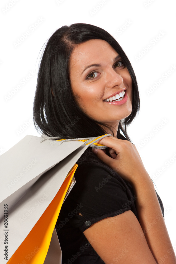 Young woman with shopping bags on white background Young woman with shopping bags on white background