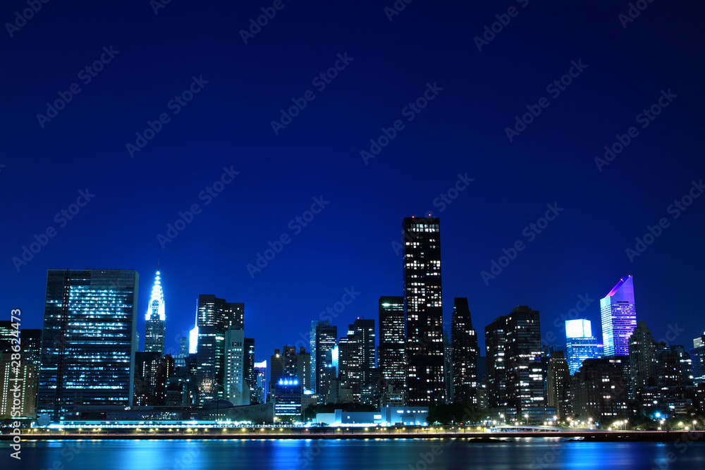 Fototapeta premium Midtown Manhattan skyline at Night Lights, Nowy Jork