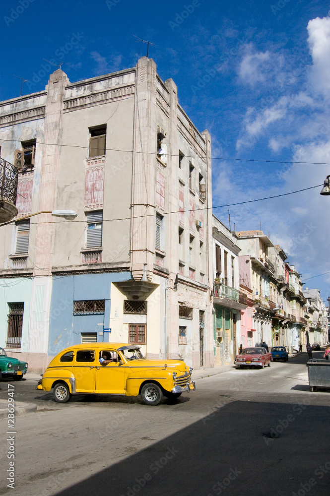 Havana street with yellow car