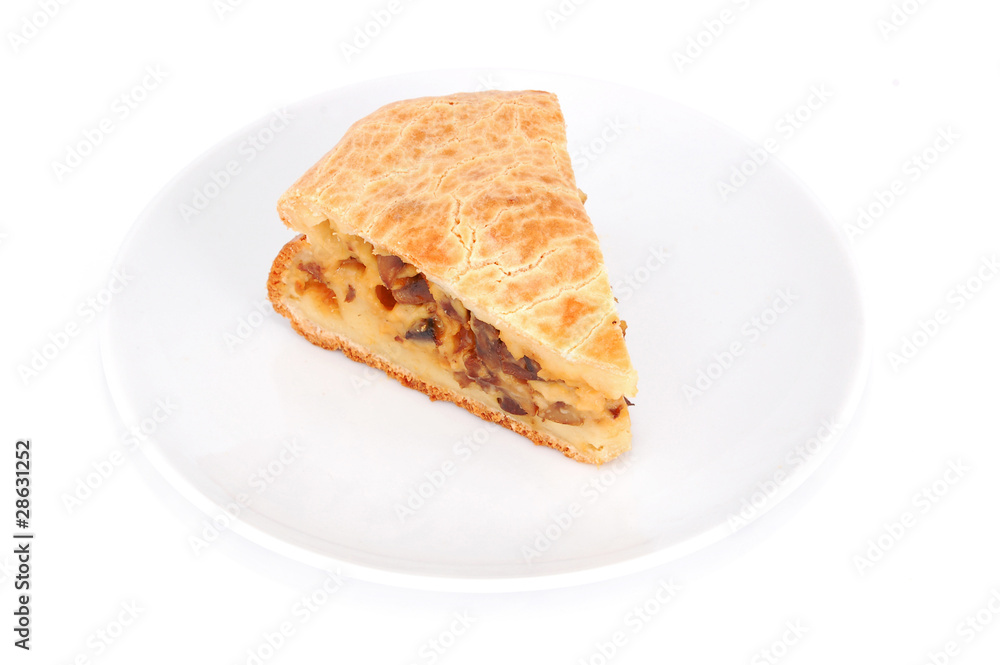 Mushroom pie on plate, isolated on white background