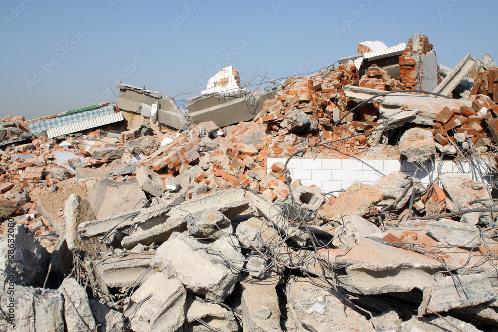 demolition of smoldering rubble