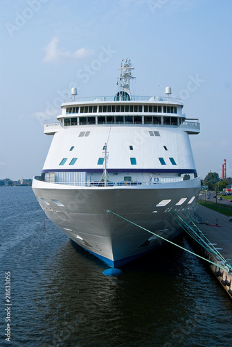 Big cruise ship in port, front view