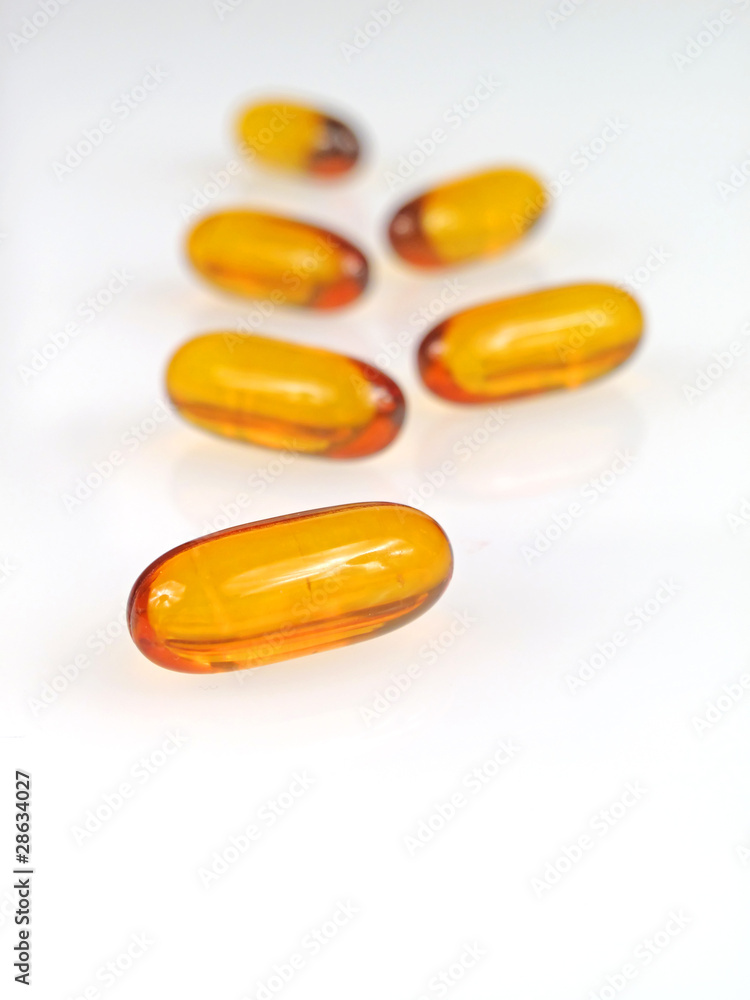 Yellow pills isolated on white Yellow pills isolated on white