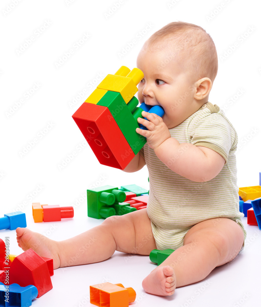 Little boy with building bricks Little boy with building bricks