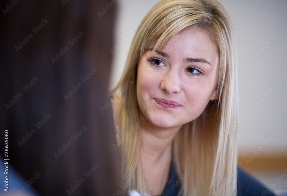 happy Student has fun while working in classroom happy Student has fun while working in classroom
