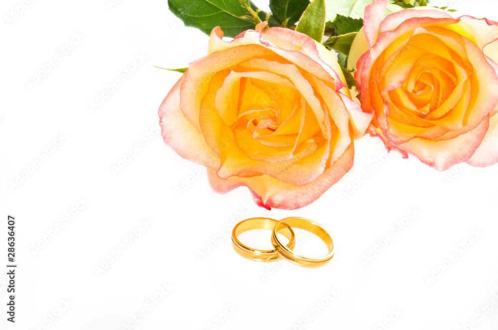Red yellow roses and golden ring over white Red yellow roses and golden ring over white