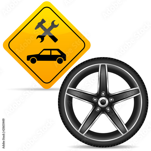 Autowerkstatt-Schild und Alufelge
