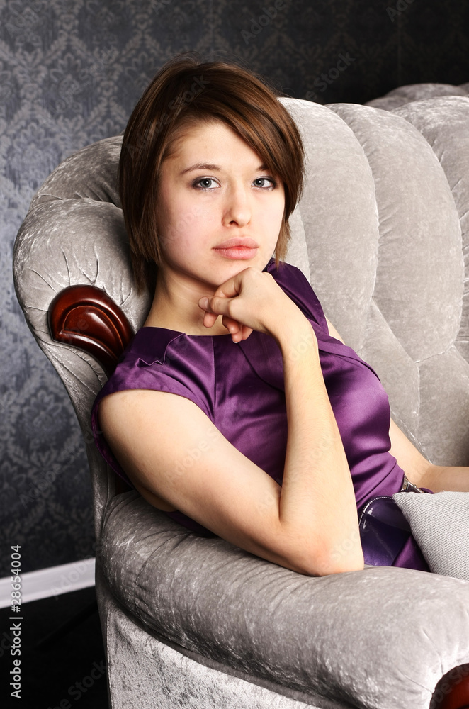 Perfect beauty sitting glamorous girl on the couch Perfect beauty sitting glamorous girl on the couch