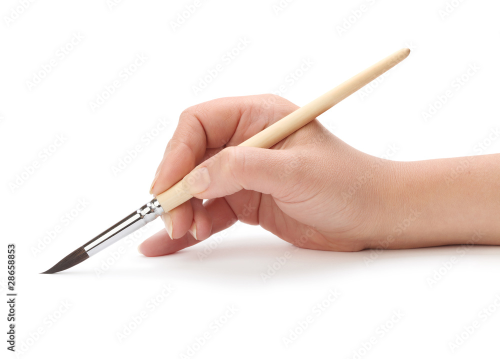 hand with brush hand with brush