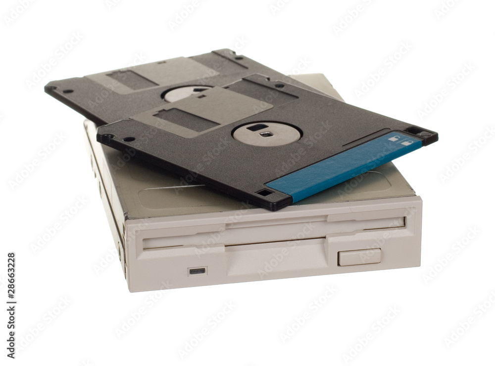 Floppy disk drive with diskettes isolated over white Floppy disk drive with diskettes isolated over white