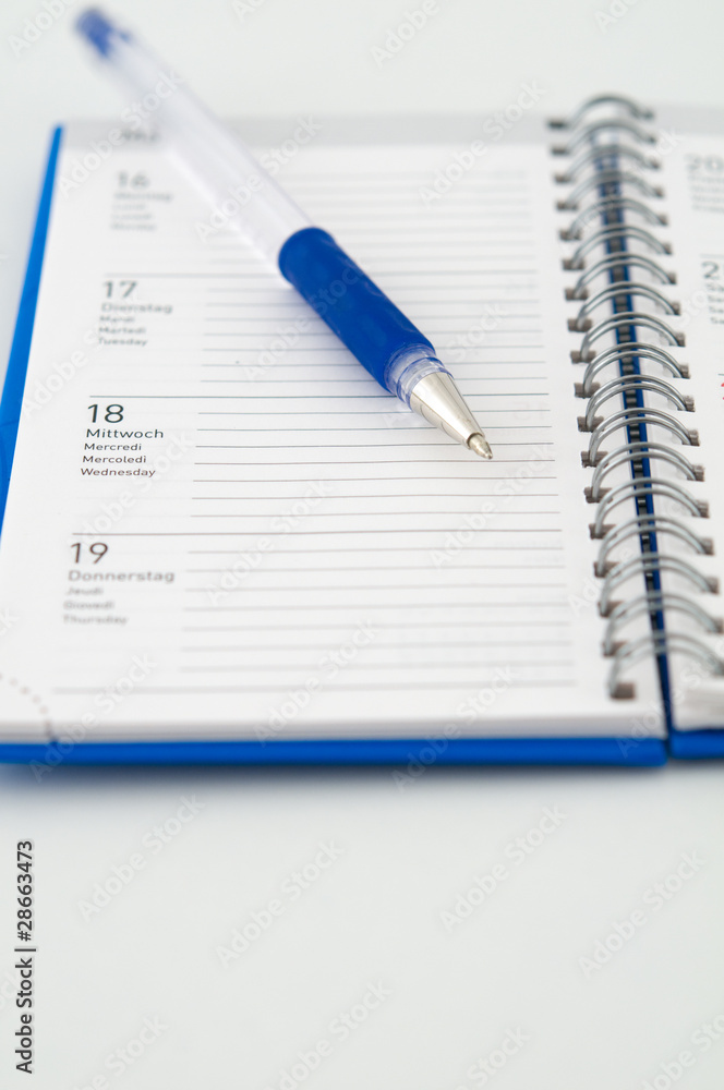 Terminkalender und Kugelschreiber Terminkalender und Kugelschreiber