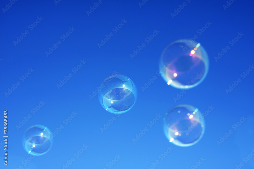 Bubbles against a blue sky