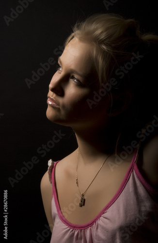 Portrait of a young girl looking suspicious