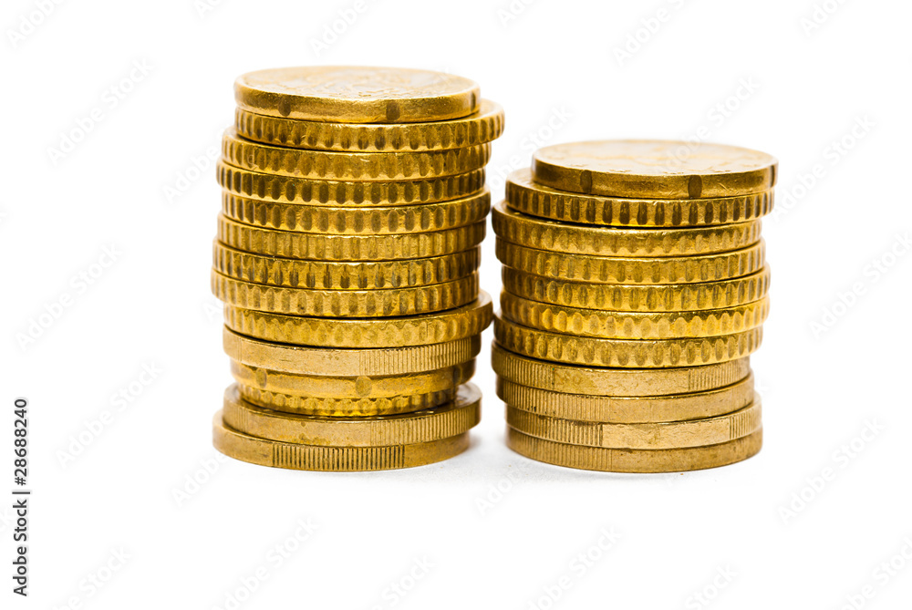 Piles of euro coins isolated on white