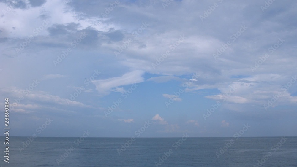 Sunny day on the sea, clouds move on the sky. Sunny day on the sea, clouds move on the sky.